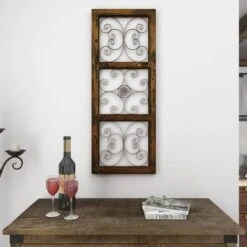 36" X 14" Wood Scroll Window Inspired Wall Decor With Metal Scrollwork Relief Brown - Olivia & May -Home Decor Shop GUEST b367931e 6ed0 4d1a ba17 4cf4aca6a24e