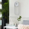 20" X 7.5" Oval Metal Pendulum Wall Clock White - CosmoLiving By Cosmopolitan 1 20" X 7.5" Oval Metal Pendulum Wall Clock White - CosmoLiving By Cosmopolitan -Home Decor Shop GUEST bff58505 4d23 4f25 a06a 3d81d9076283